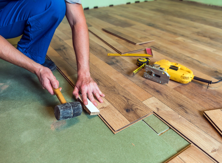 contractor installing thin vinyl flooring houston tx