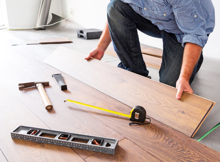 contractor measuring vinyl flooring houston tx
